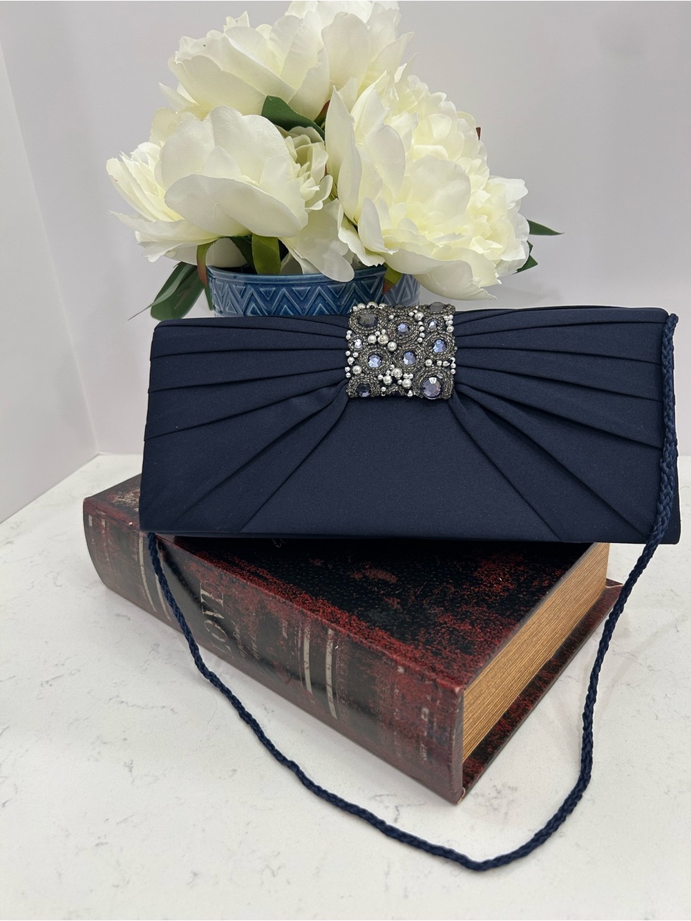 Jessica McClintock Navy Evening Clutch with jeweled brooch